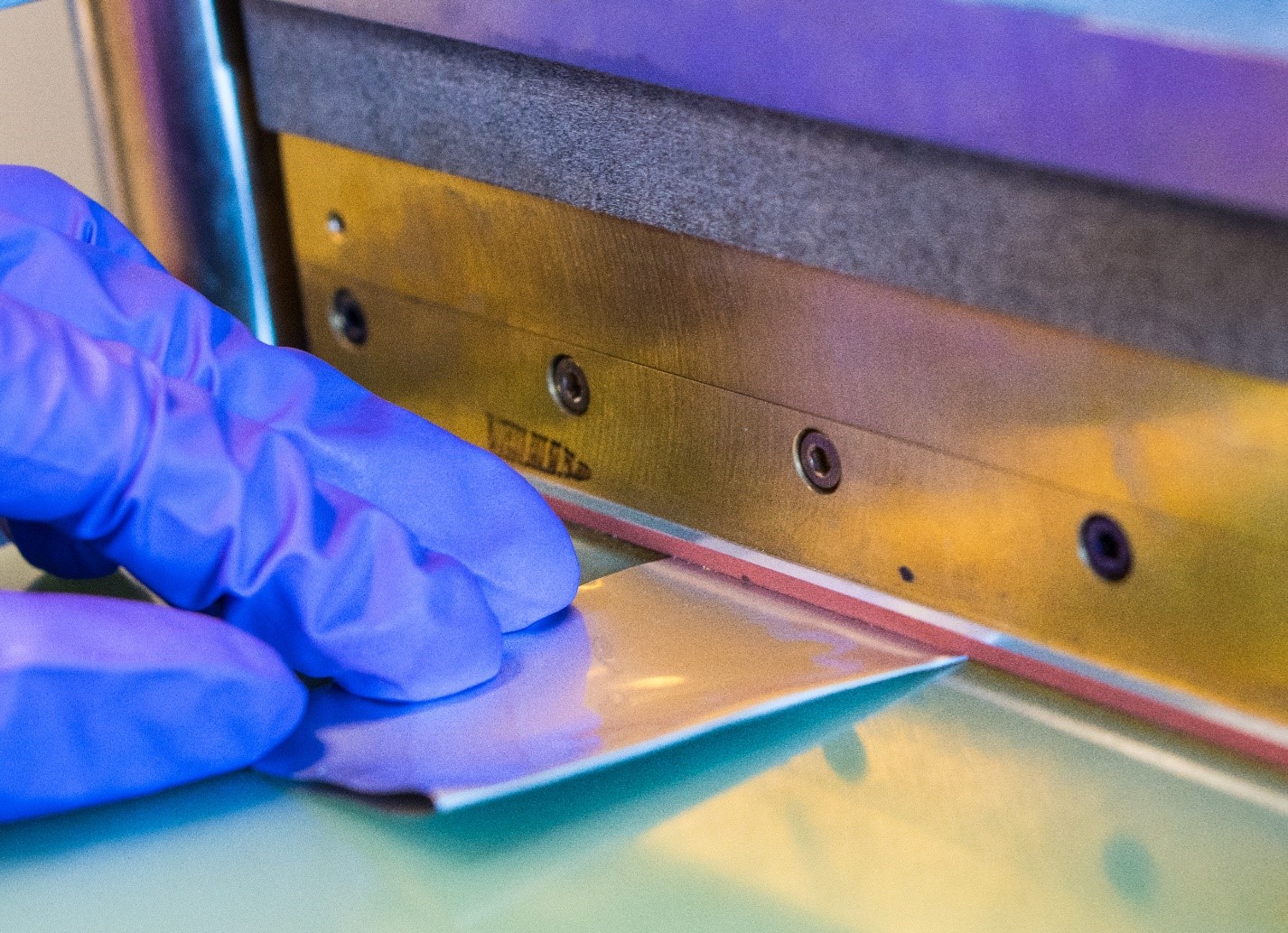 close up of a battery pouch cell being sealed