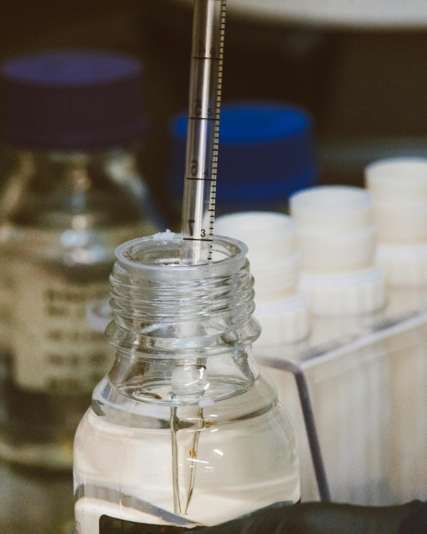 Electrolyte in glass container being pipetted up