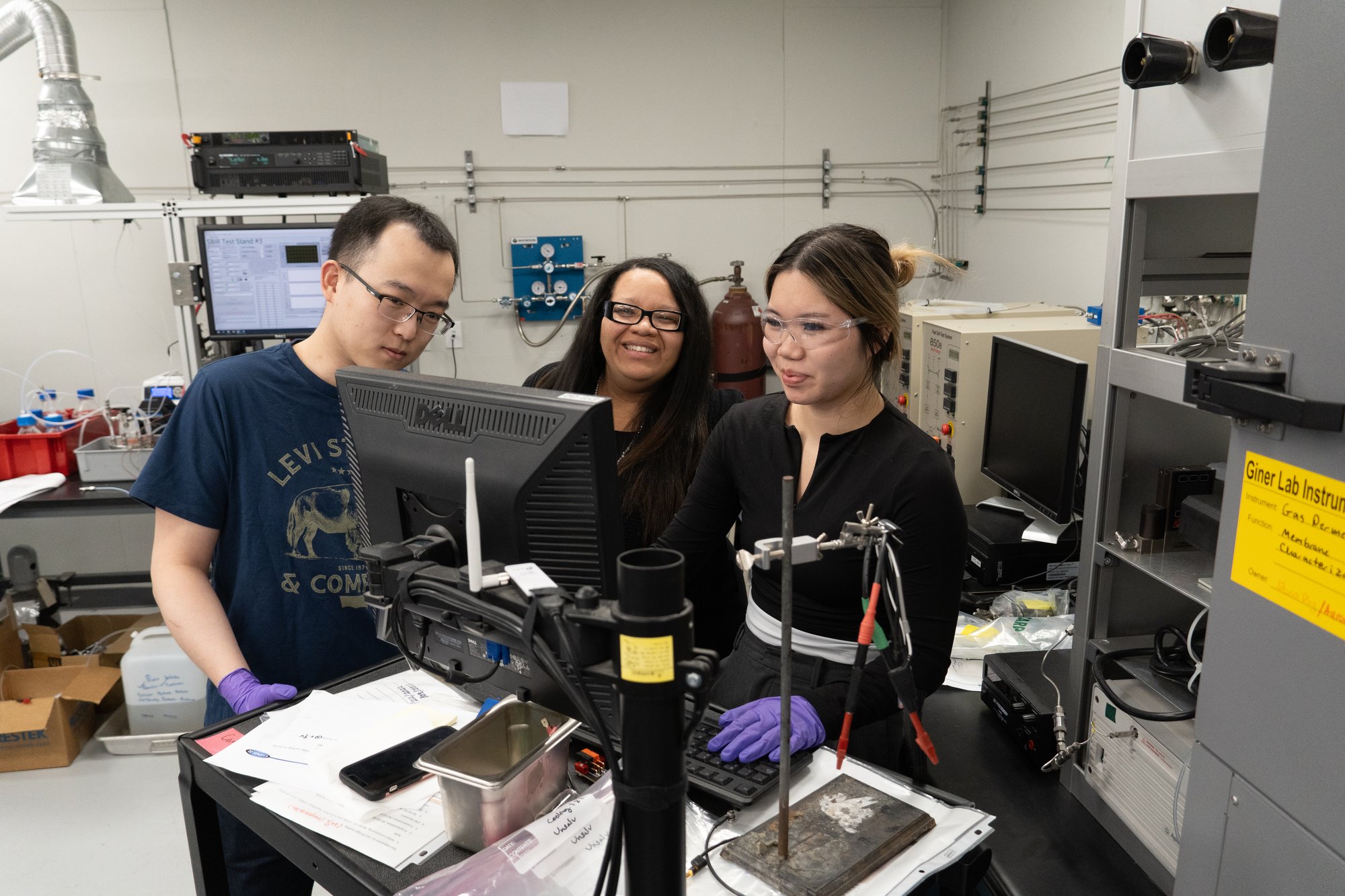 Engineers at a test stand with computer Engineers at a test stand with computer